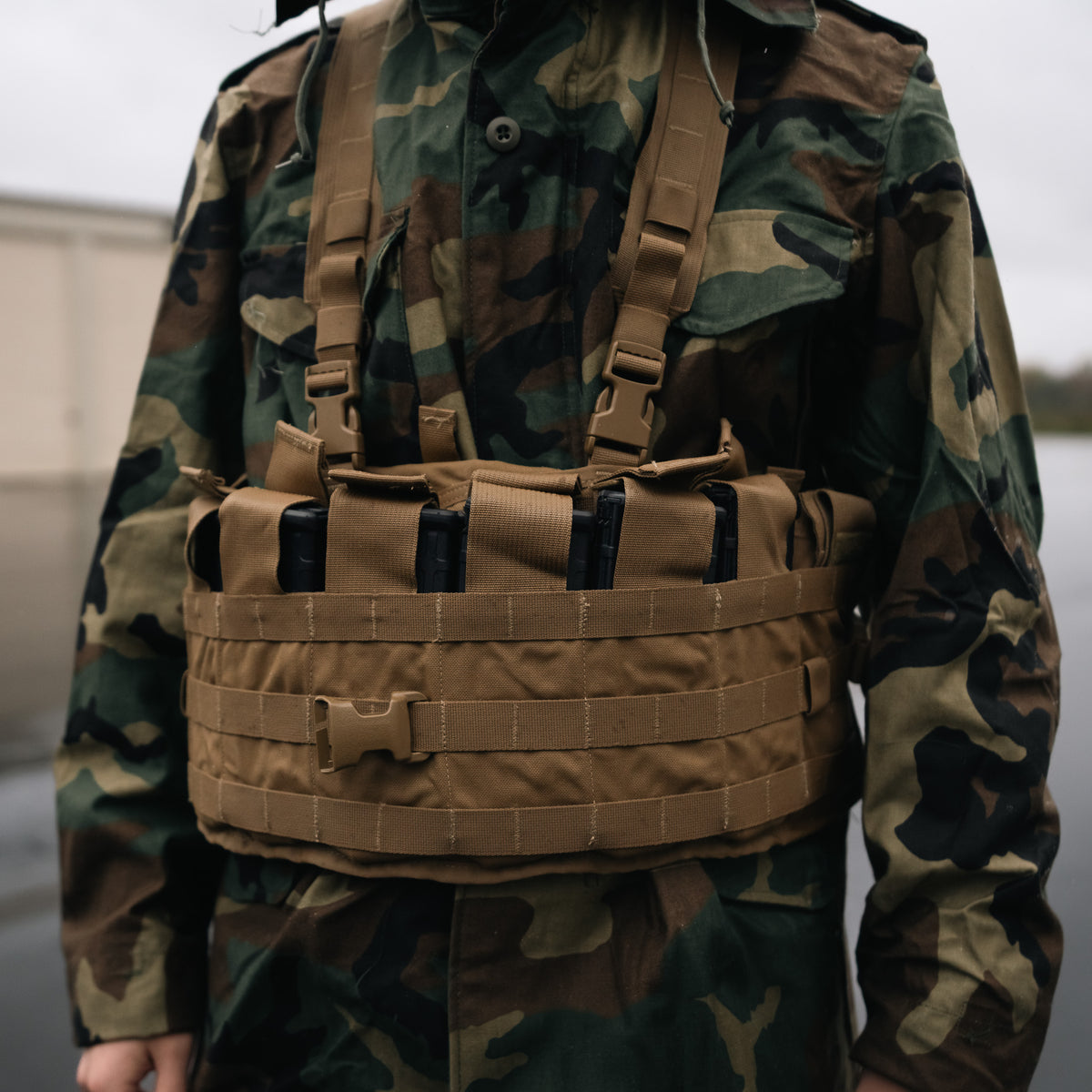 Close up of man wearing USMC TAP Chest Rig