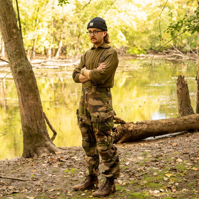 Man crossing his arms while wearing French Army Combat Pants